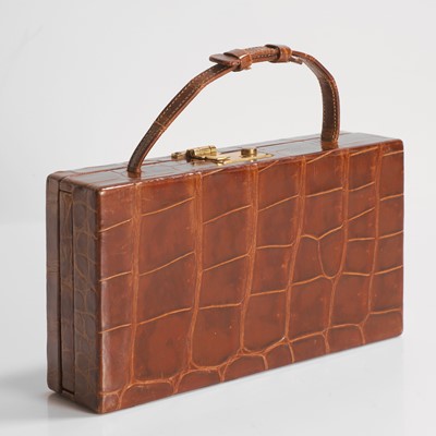 Lot 450 - An Asprey crocodile travelling jewellery case