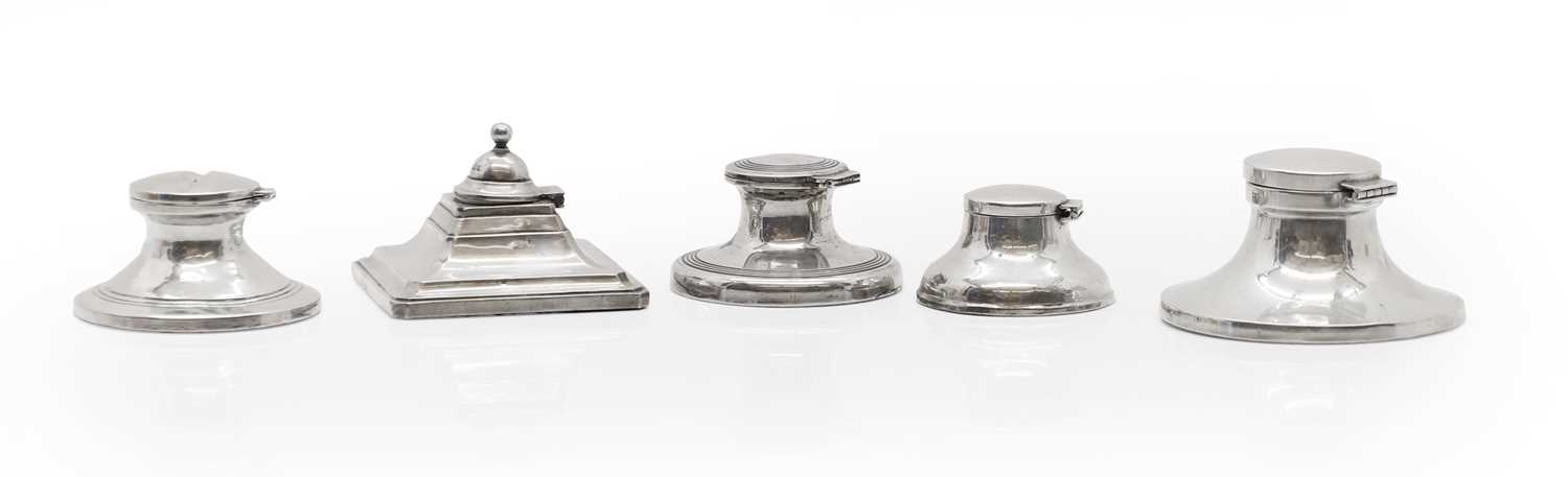 Lot 41 - A group of five single silver inkwells