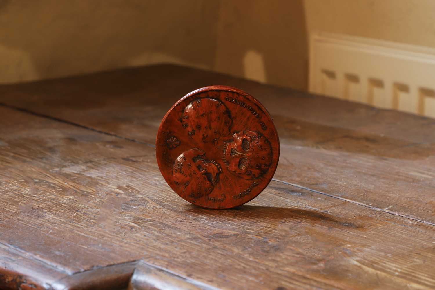 Lot 529 - A burr wood circular apothecary patch box