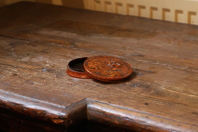 Lot 529 - A burr wood circular apothecary patch box