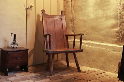 Lot A George III vernacular oak and ash armchair