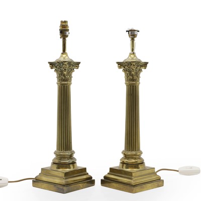 Lot 394 - Two large brass Corinthian column table lamps