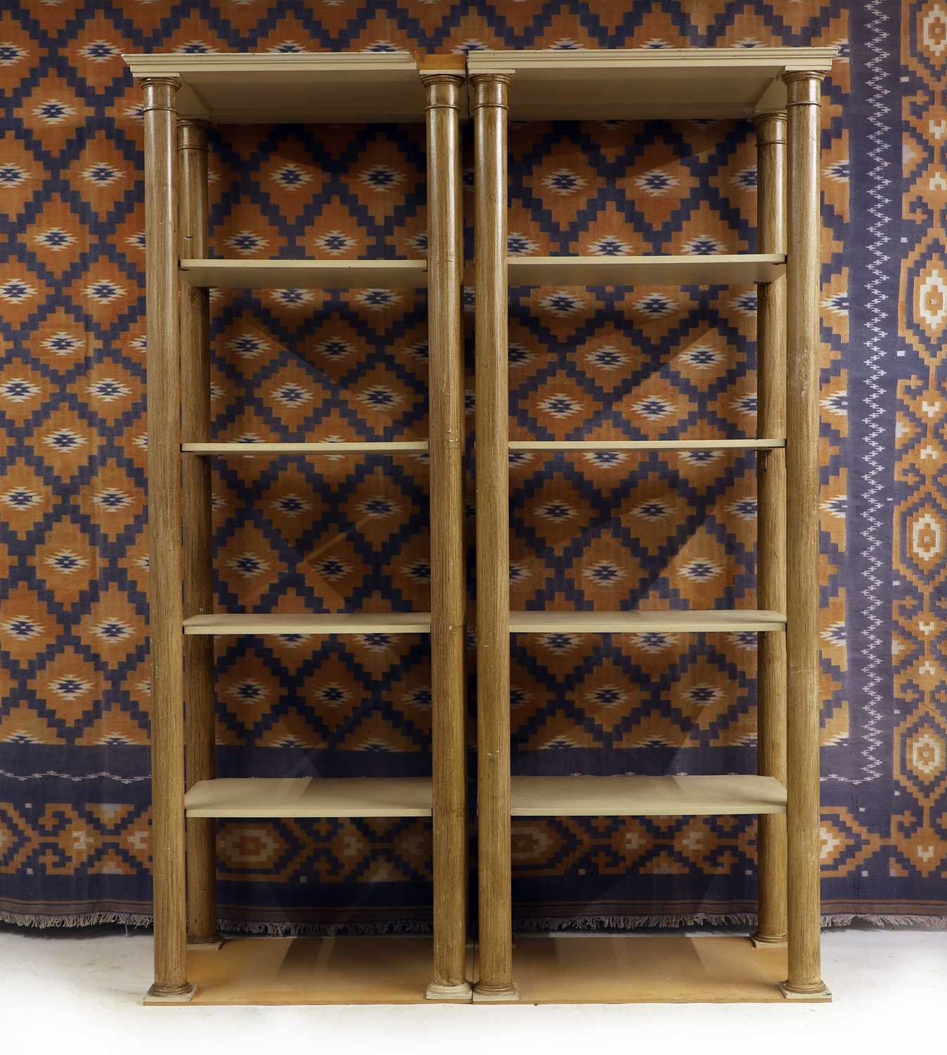 Lot 631 - A pair of tall painted open shelves