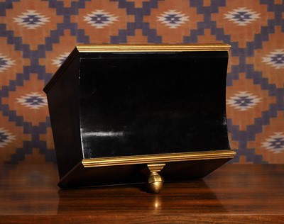 Lot An ebonised and parcel gilt wall bracket