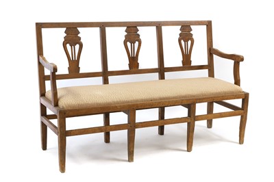 Lot 403 - An elm three-seater settee