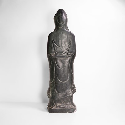 Lot 125 - A large Chinese spinach jade carving