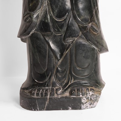 Lot 125 - A large Chinese spinach jade carving
