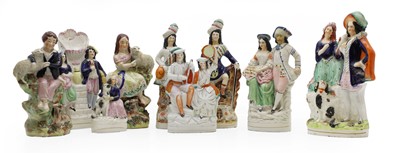 Lot 120 - A collection of nine Staffordshire figures