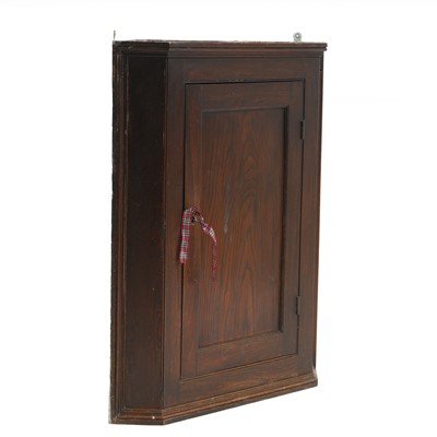 Lot 380 - An elm hanging corner cupboard