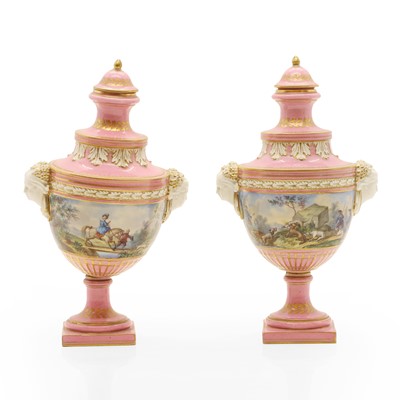 Lot 179 - A pair of Sèvres urns with covers