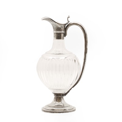 Lot 11 - A ribbed glass silver mounted ewer