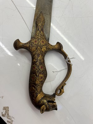 Lot 123 - A collection of Indian and Middle Eastern swords