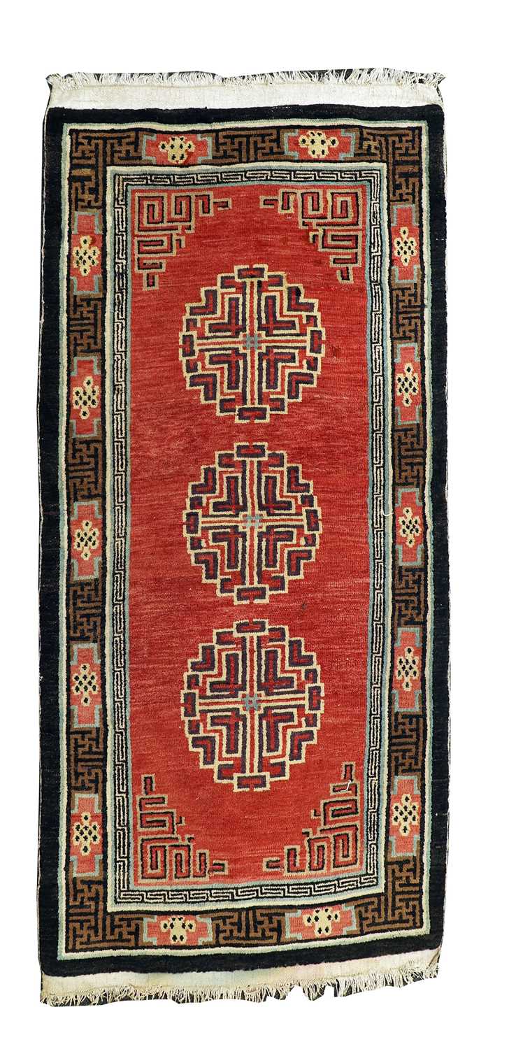 Lot 640 - A tufted wool carpet