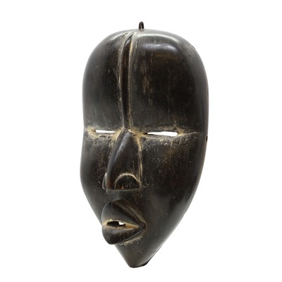 Lot 468 - A carved hardwood Dan mask