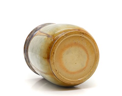 Lot 303 - A Royal Doulton glazed tobacco jar and cover