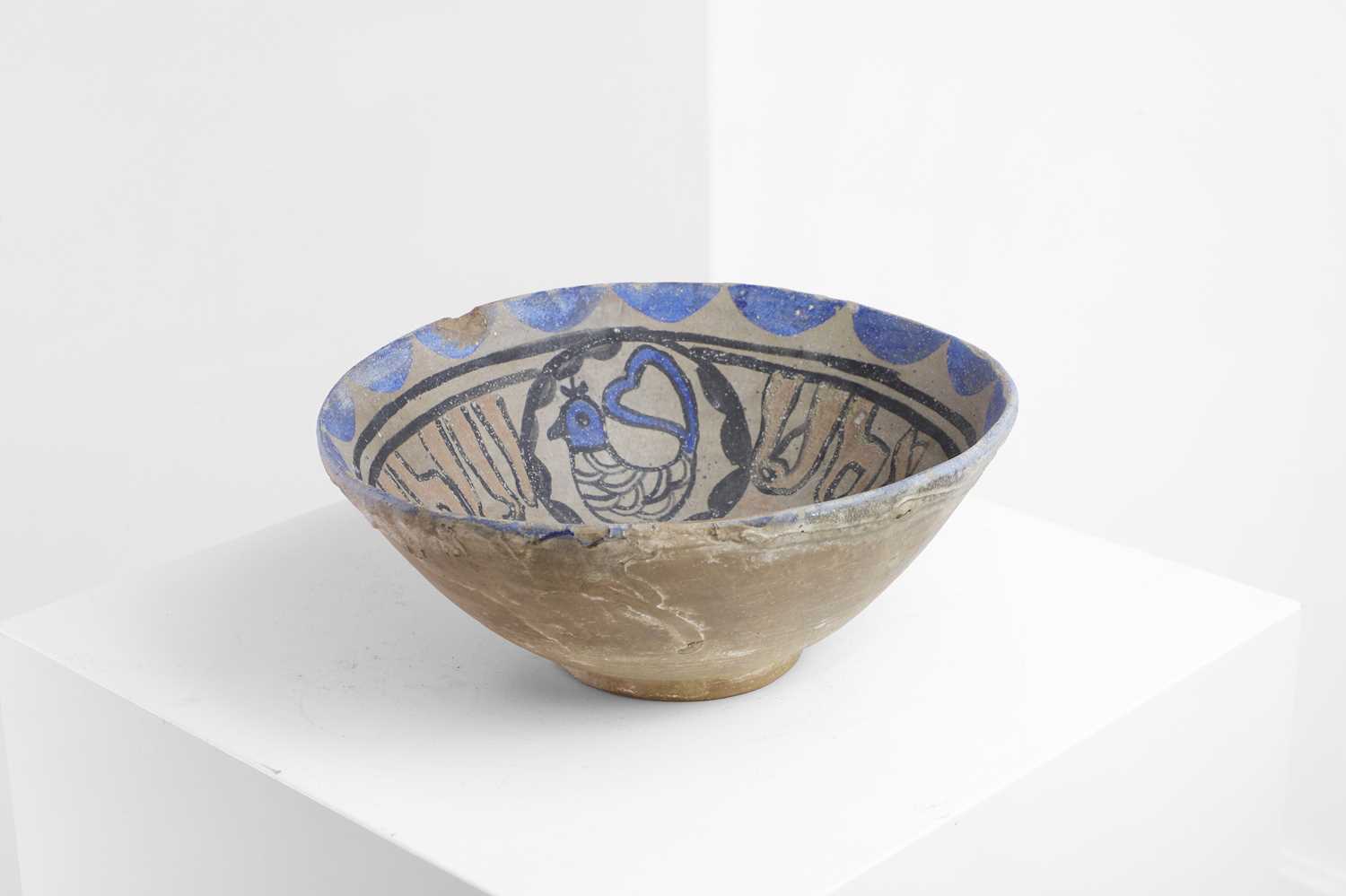 Lot 65 - A Nishapur-style pottery bowl
