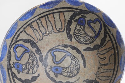Lot 65 - A Nishapur-style pottery bowl
