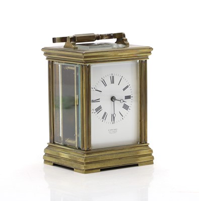 Lot 380 - A brass carriage clock