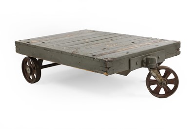 Lot 503 - A grey painted industrial three wheel coffee table