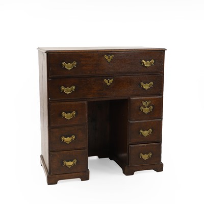 Lot 534 - A George II mahogany kneehole desk
