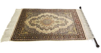 Lot 468 - A Persian silk rug
