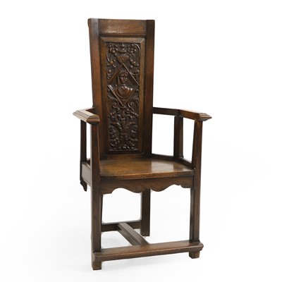 Lot 509 - A carved oak Caqueteuse type chair