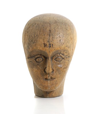Lot 313 - A carved wooden milliners head