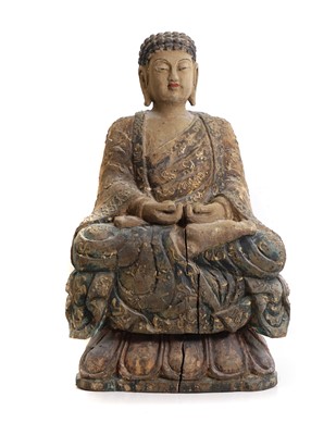 Lot 181 - A carved wooden Buddha