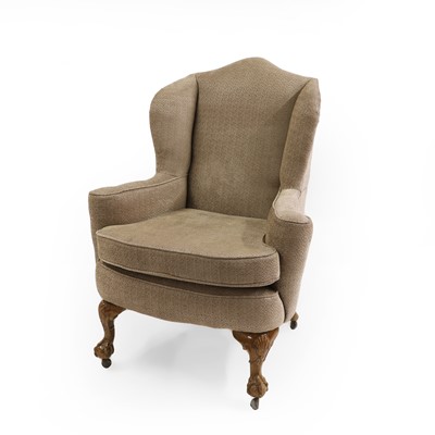 Lot 504 - A George III style walnut wingback armchair