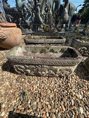 Lot 599 - A set of four oblong planters