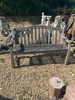 Lot 592 - A teak slatted bench