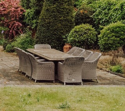 Lot 595 - A woven 'rattan' garden dining suite