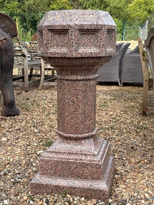 Lot 591 - A carved pink granite font