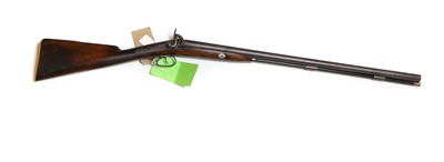 Lot 128 - A double barrel side by side shotgun