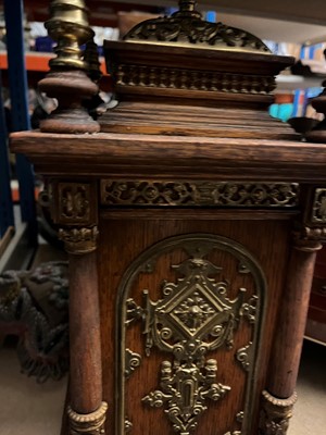 Lot 384 - A oak and gilt-metal mantel clock