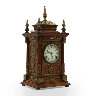 Lot 384 - A oak and gilt-metal mantel clock