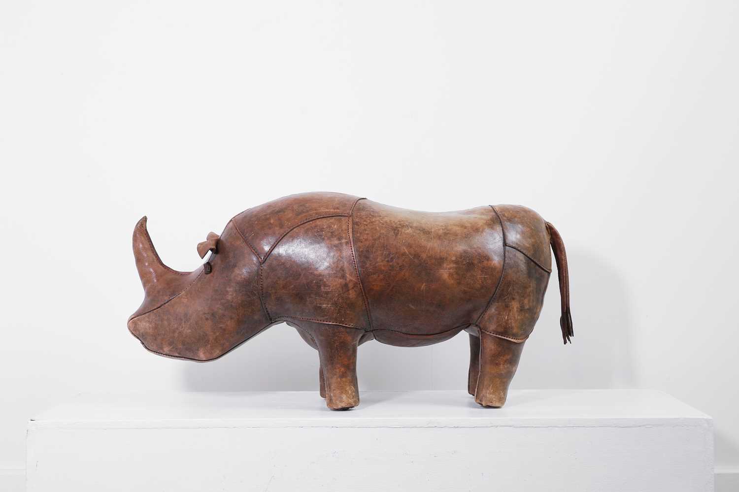 Lot 324 - A leather rhino footstool