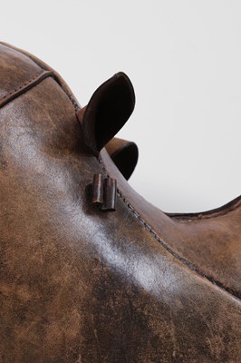Lot 324 - A leather rhino footstool