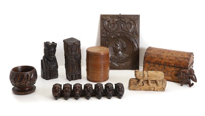 Lot 317 - A collection of wooden carved panels