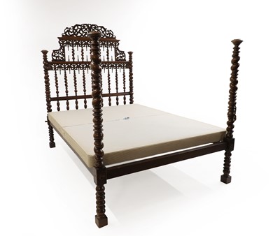 Lot 539 - A large Anglo Indian mahogany bed
