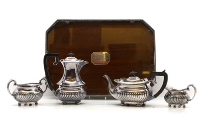 Lot 18 - A silver-plated four-piece service