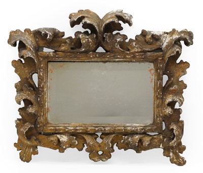 Lot 440 - A carved giltwood mirror