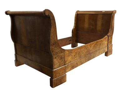 Lot 768 - A walnut sleigh bed