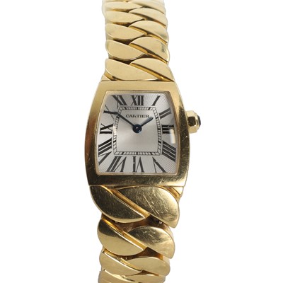 Lot 358 - A ladies' 18ct gold Cartier La Dona quartz bracelet watch, c.2006