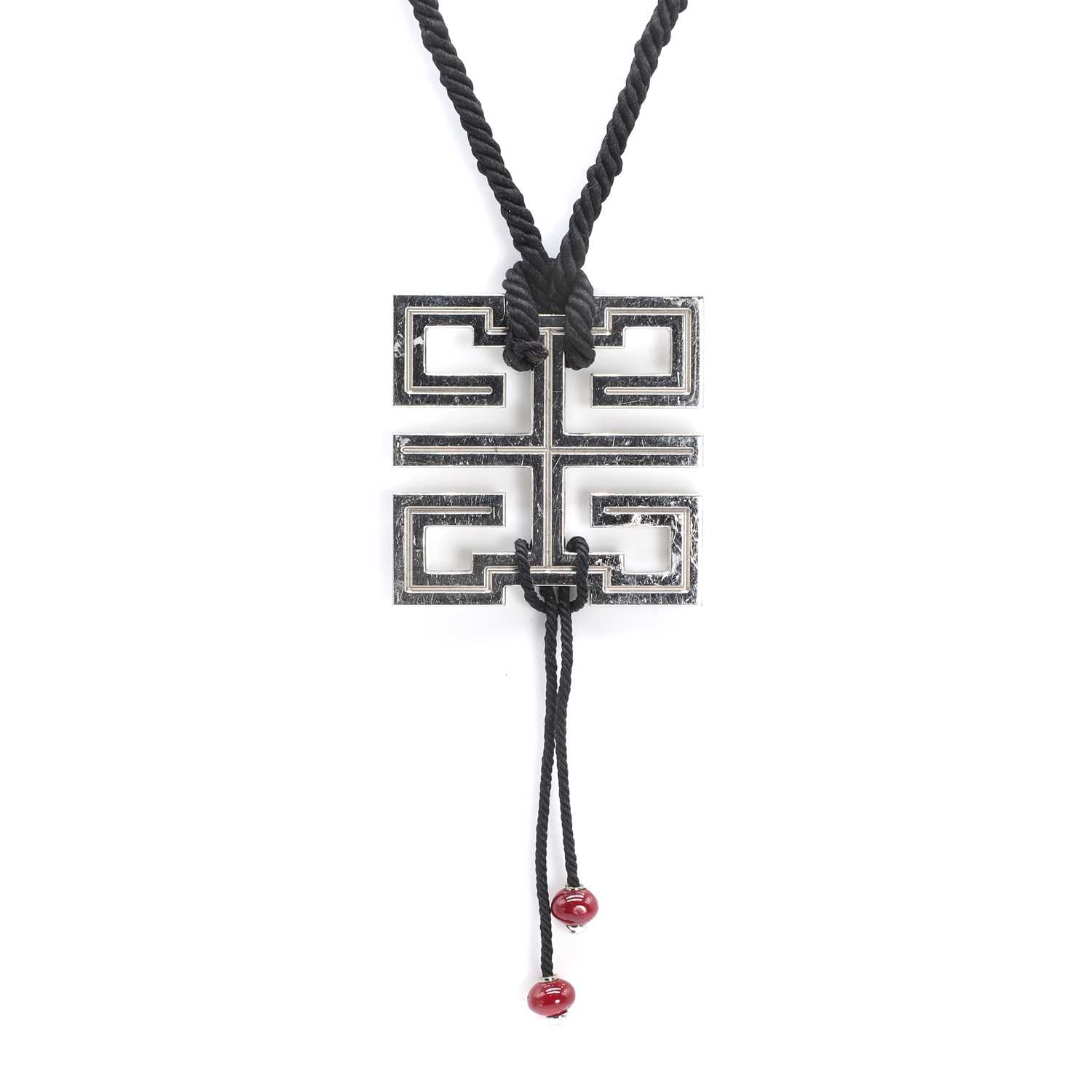 Lot 239 - An 18ct white gold Le Baiser du Dragon pendant, by Cartier
