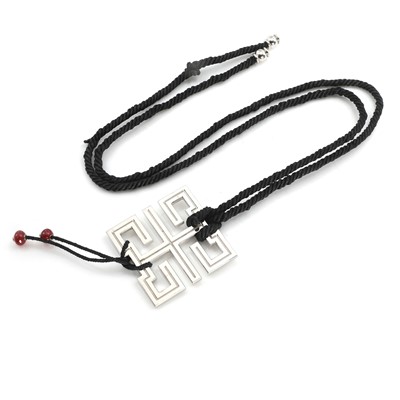 Lot 239 - An 18ct white gold Le Baiser du Dragon pendant, by Cartier