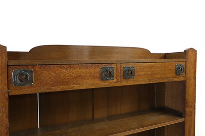 Lot 543 - An Arts and Crafts dwarf open bookcase