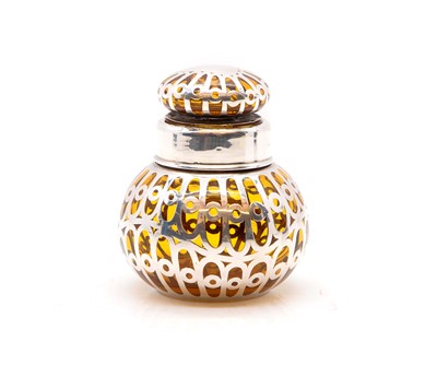 Lot 2 - A silver mounted amber glass bottle and stopper