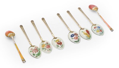 Lot 69 - A cased set of silver gilt and enamel spoons