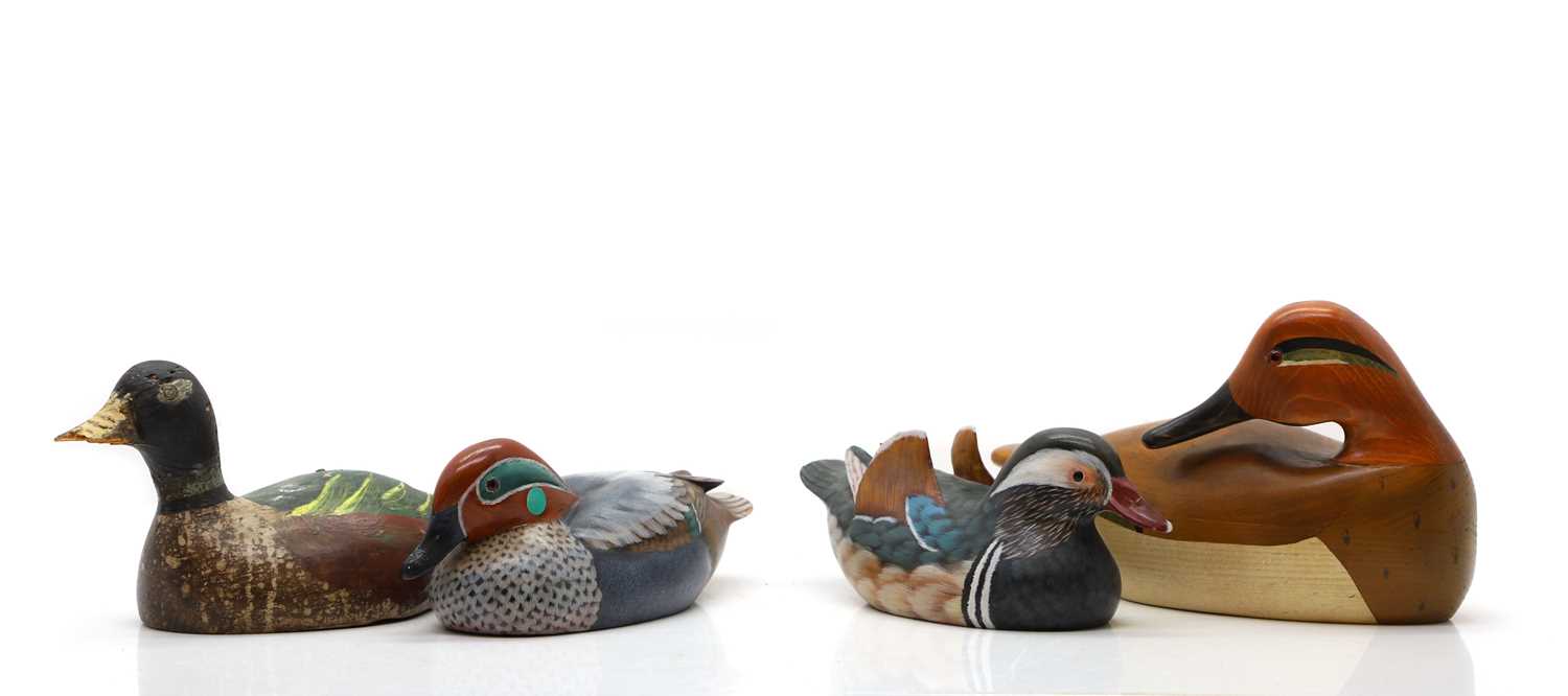 Lot 475 - Four modern carved duck decoys, by Jim Harkness